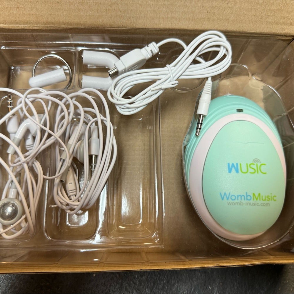 Baby heartbeat monitor. Works great! Comes with headphones and plugs